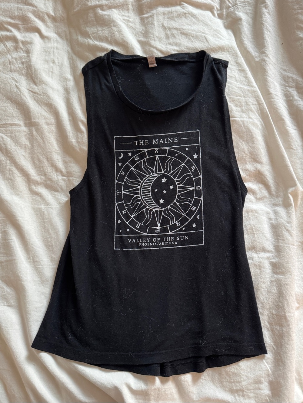 The Maine Black Graphic Muscle Tank with Celestial Sun-Moon Design